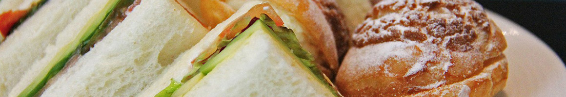 Eating Deli Sandwich at Marina Submarine restaurant in San Francisco, CA.